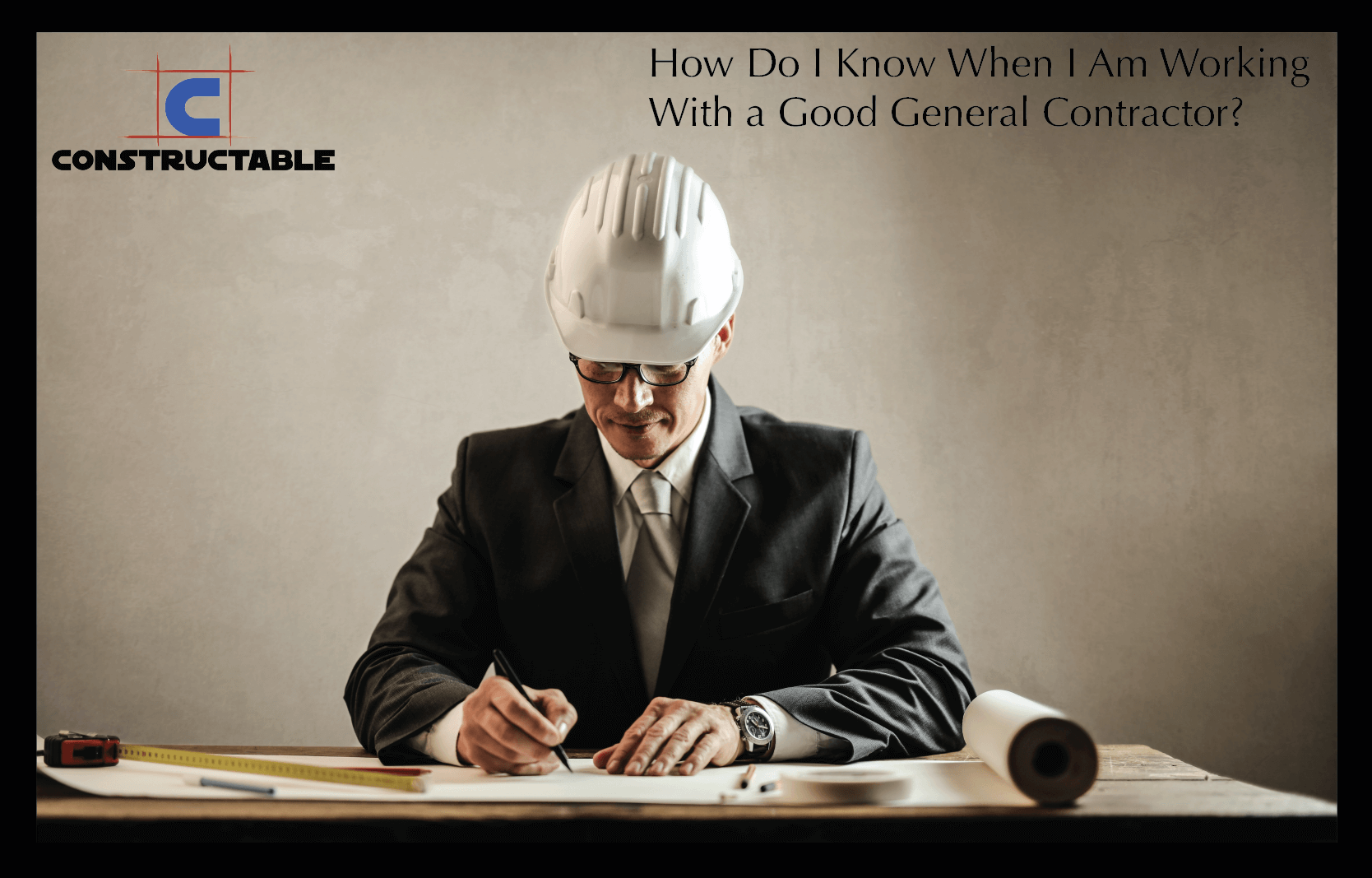 A professional man in a suit and hard hat writes on a blueprint at a desk with measuring tools, focusing on construction costs, with a logo and text about choosing a good general contractor.