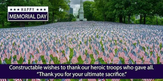 Memorial Day banner with the phrase "Happy Memorial Day" over a vast field of American flags planted in the ground, symbolizing respect for fallen soldiers, with construction costs influencing the Capitol dome's renovation