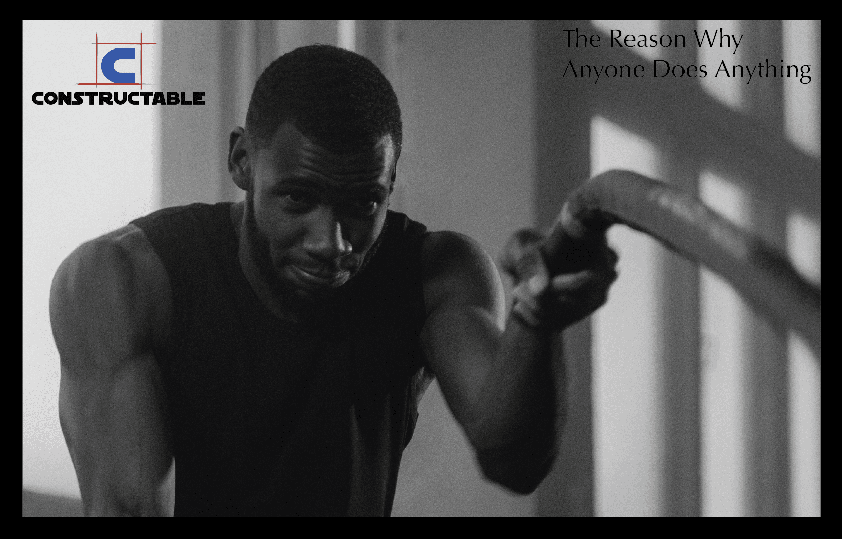 A focused black man in a sleeveless shirt leans forward while stretching in a gym, with a motivational slogan "the construction costs of success" on the right and a logo "constructable" on the